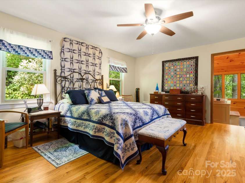 2981 Heath Peak Road, Waynesville, NC 28785.  MLS# CAR4266854, YatesRealty ID 24381. View from the primary into the indoor hot tub room