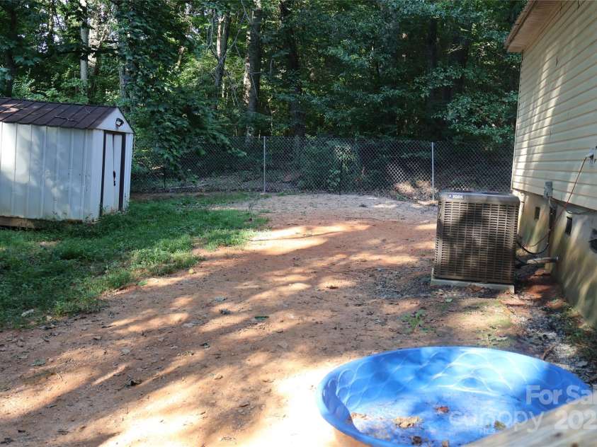 226 Lake Sylvia Road, Lincolnton, NC 28092.  MLS# CAR4267885, YatesRealty ID 24382. Back yard
