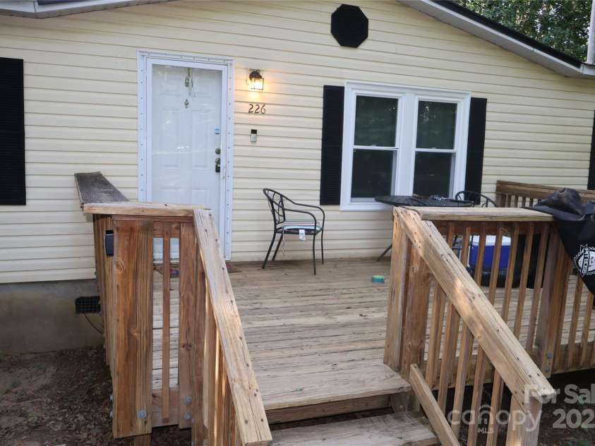 226 Lake Sylvia Road, Lincolnton, NC 28092.  MLS# CAR4267885, YatesRealty ID 24382. Front porch