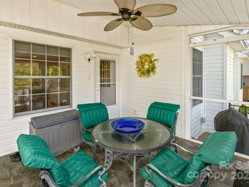 301 Theron Court, Candler, NC 28715.  MLS# CAR4250972, YatesRealty ID 24385. Screened porch located just off the kitchen and breakfast room