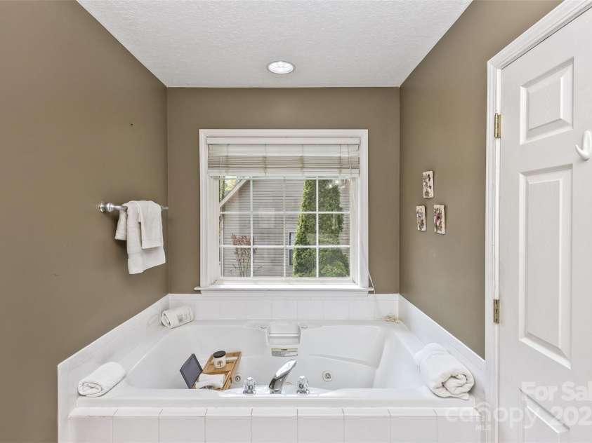 301 Theron Court, Candler, NC 28715.  MLS# CAR4250972, YatesRealty ID 24385. With whirlpool tub for relaxing
