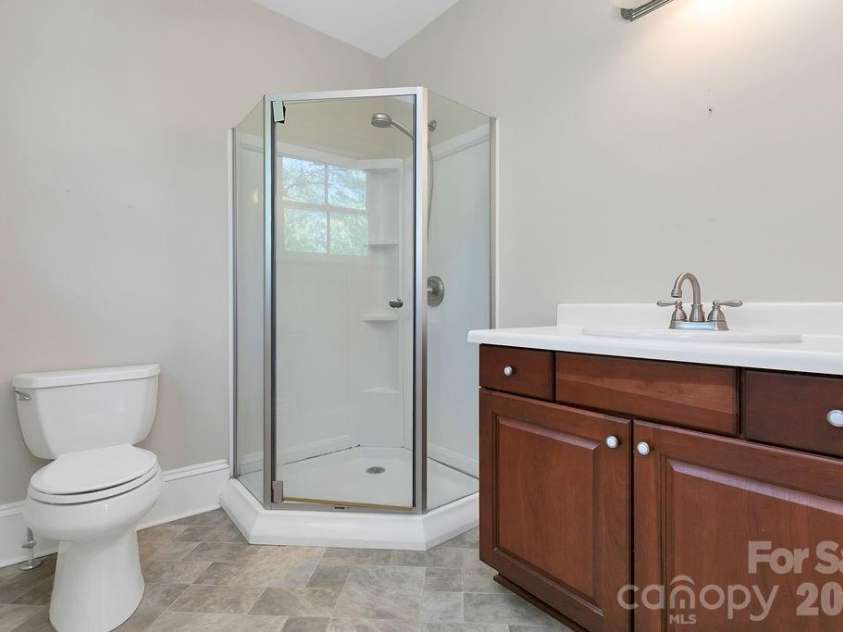 208 Probart Street, Brevard, NC 28712.  MLS# CAR4384508, YatesRealty ID 24387. Primary Bathroom