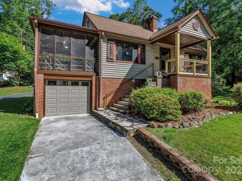 111 Assembly Drive, Montreat, NC 28757.  MLS# CAR4271152, YatesRealty ID 24388. Single car garage as well as a workbench and crawl space for storage.