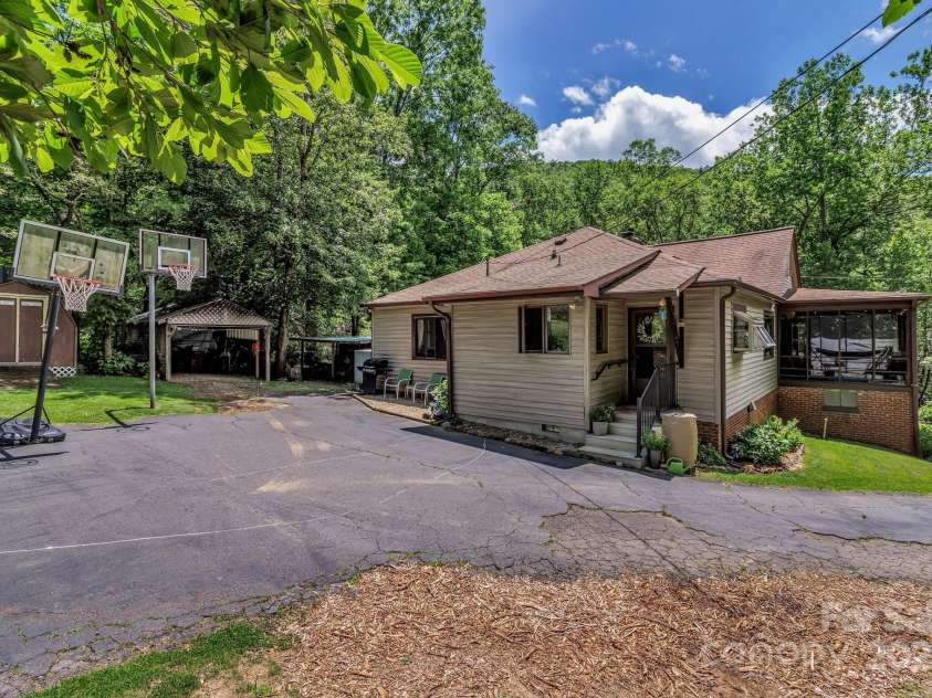111 Assembly Drive, Montreat, NC 28757.  MLS# CAR4271152, YatesRealty ID 24388. Two additional storage areas in the back yard for additional parking, yard tools, or storage.