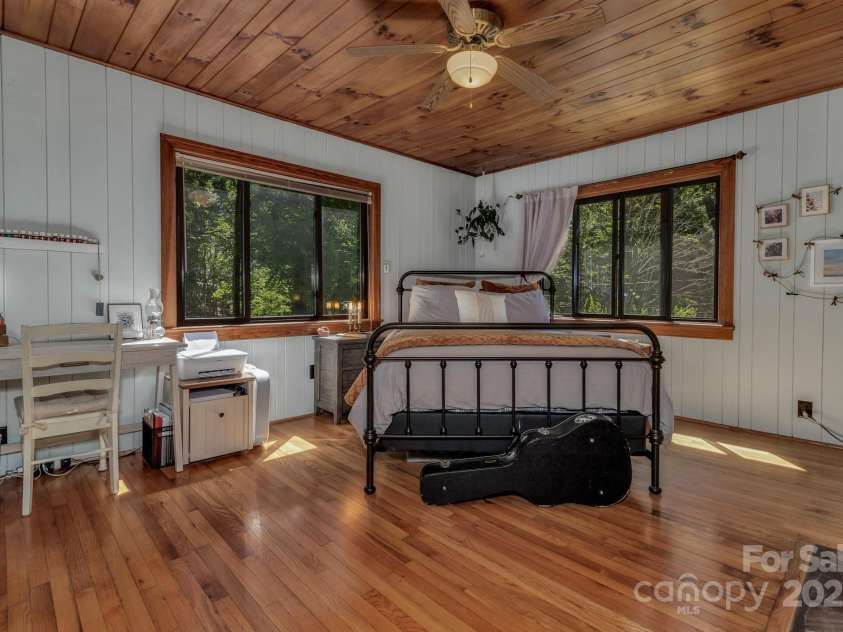 111 Assembly Drive, Montreat, NC 28757.  MLS# CAR4271152, YatesRealty ID 24388. What we use as a primary sweet with old fireplace, mantle and larger walk-in, cedar-lined closet.
