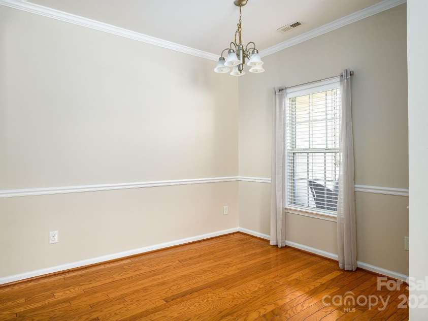 111 Brickwalk Court, Mocksville, NC 27028.  MLS# CAR4235058, YatesRealty ID 2439. Dining room features hardwood floors