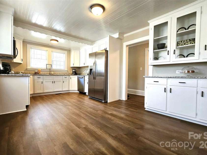 169 Freeze Avenue, Concord, NC 28025.  MLS# CAR4254472, YatesRealty ID 24392. Kitchen is huge. 