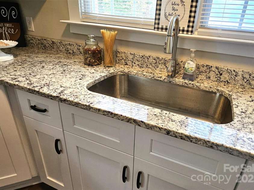 169 Freeze Avenue, Concord, NC 28025.  MLS# CAR4254472, YatesRealty ID 24392. New farm sink. 