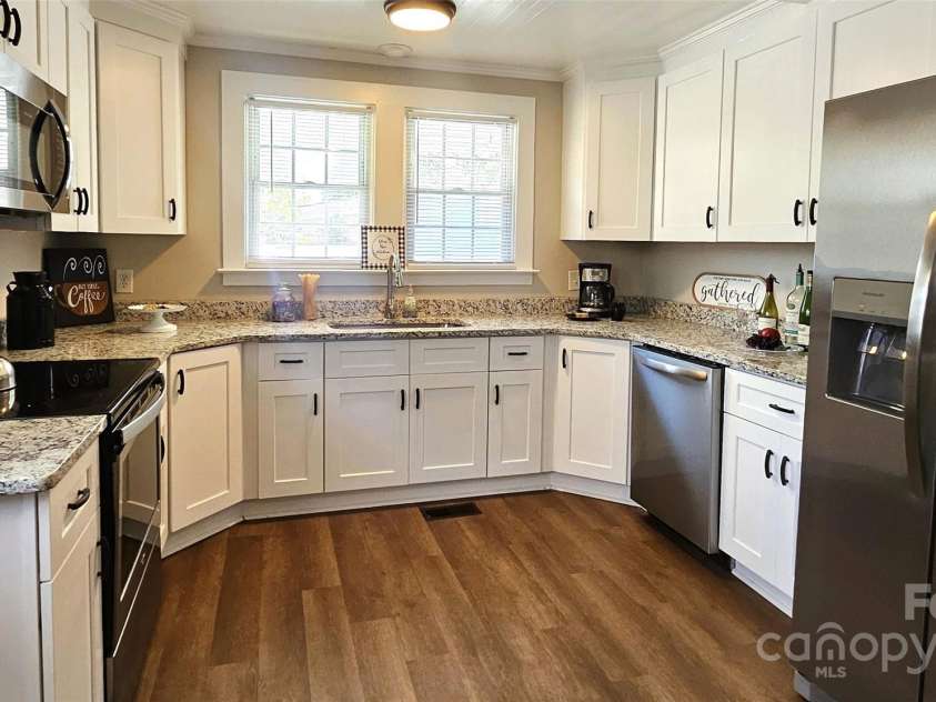 169 Freeze Avenue, Concord, NC 28025.  MLS# CAR4254472, YatesRealty ID 24392. New Kitchen cabinets  & granite counters. 