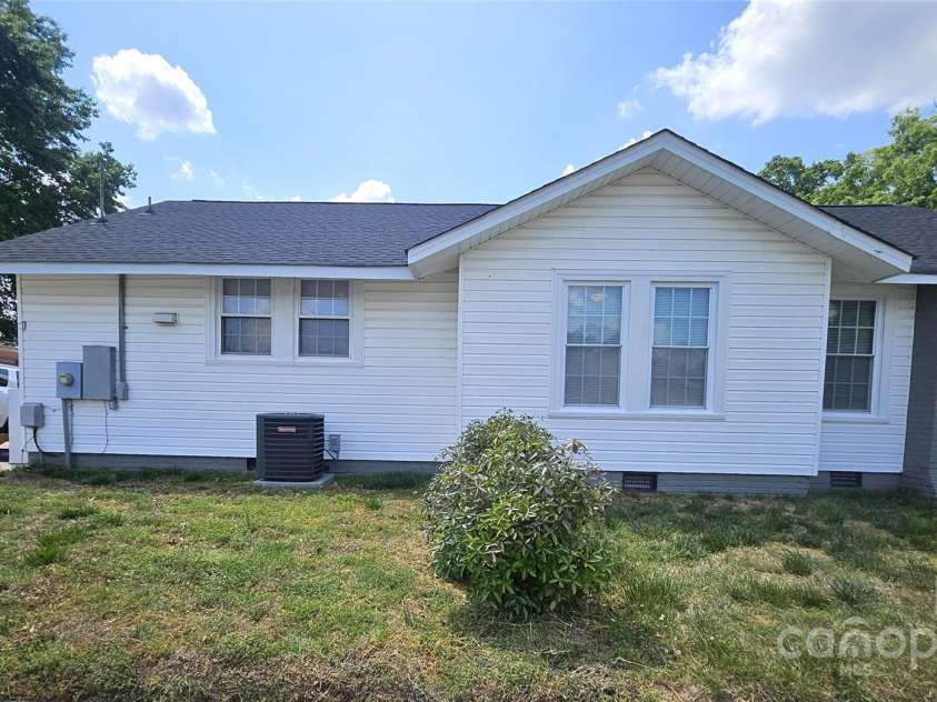 169 Freeze Avenue, Concord, NC 28025.  MLS# CAR4254472, YatesRealty ID 24392. Side two of home. 
