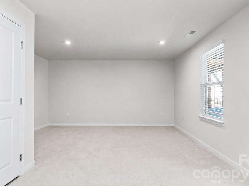 2607 Grantham Place Drive, Fort Mill, SC 29715.  MLS# CAR4380219, YatesRealty ID 24392. Downstairs Flex Space
