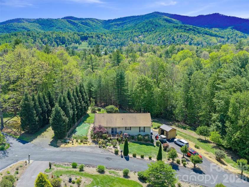 282 Sourwood Drive, Spruce Pine, NC 28777.  MLS# CAR4379946, YatesRealty ID 24393. 