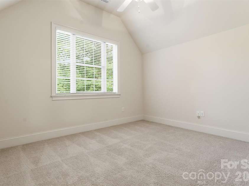 279 Woodstream Circle, Mooresville, NC 28117.  MLS# CAR4370346, YatesRealty ID 24395. Bedroom #3 with vaulted ceiling