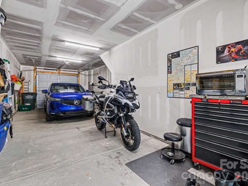 562 West End Drive, Charlotte, NC 28208.  MLS# CAR4375491, YatesRealty ID 24398. 2 car garage