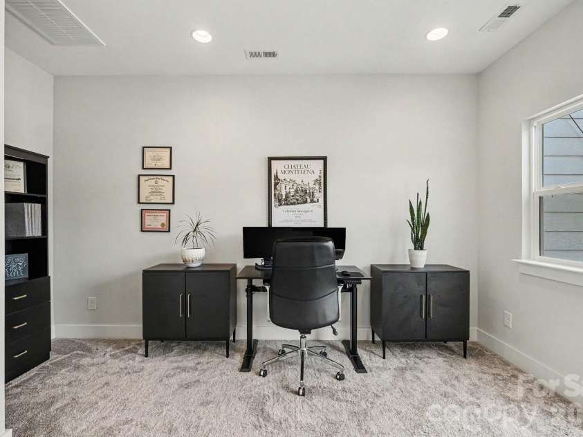 562 West End Drive, Charlotte, NC 28208.  MLS# CAR4375491, YatesRealty ID 24398. Flex room used as an office