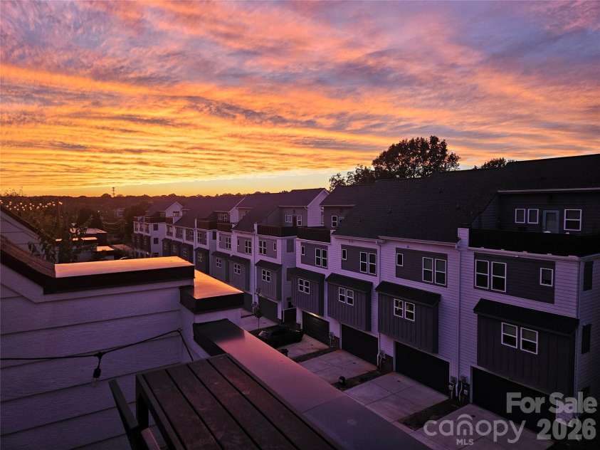 562 West End Drive, Charlotte, NC 28208.  MLS# CAR4375491, YatesRealty ID 24398. Rooftop terrace is great for watching sunsets