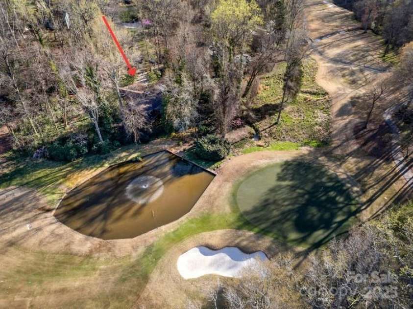 32 Fairway Ridge, Lake Wylie, SC 29710.  MLS# CAR4234343, YatesRealty ID 24400. Aerial view home on golf course overlooked 12th green and pond