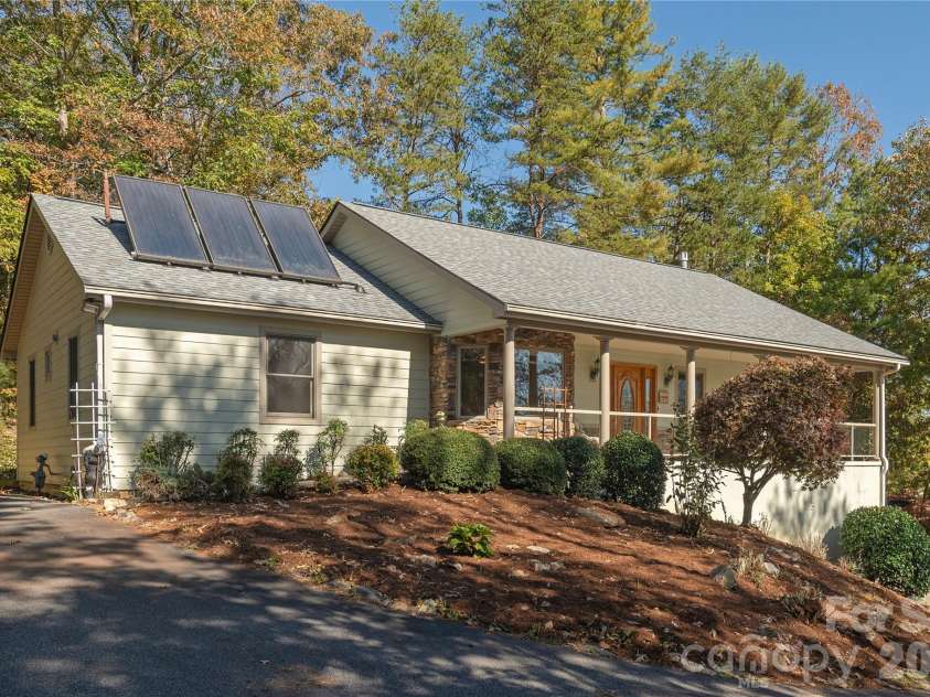 1510 Chestnut Gap Road, Hendersonville, NC 28792.  MLS# CAR4314320, YatesRealty ID 24409. Multi level parking for main-level entry