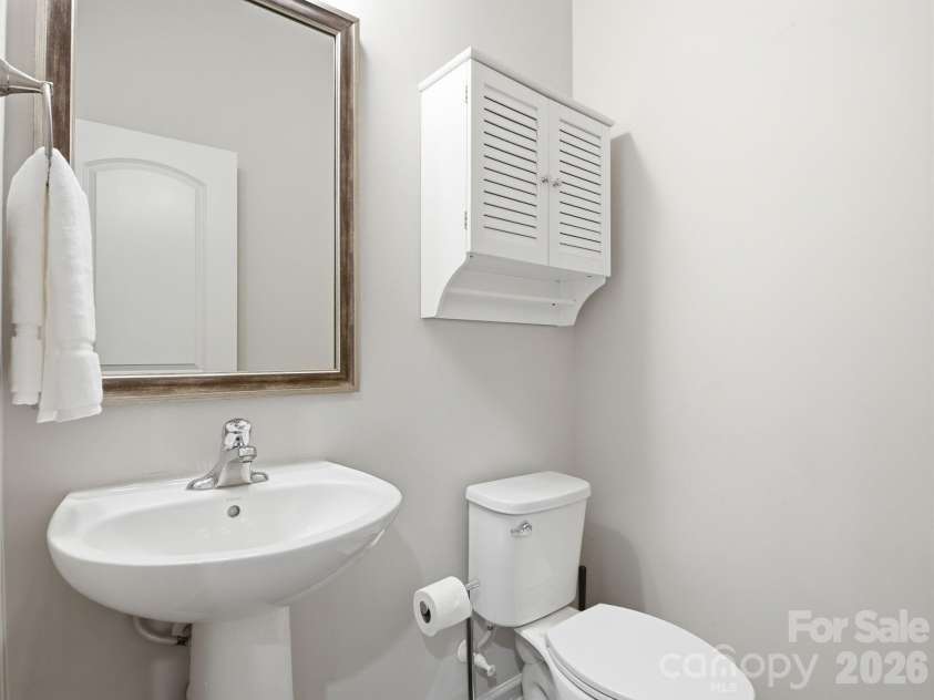 1038 Doveridge Street, Charlotte, NC 28273.  MLS# CAR4432496, YatesRealty ID 24412. Powder bathroom