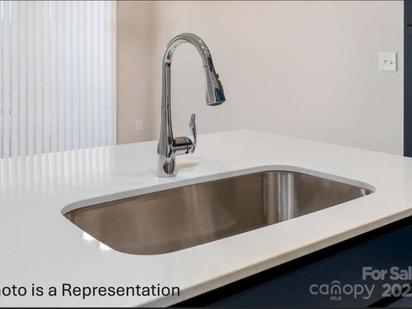 5142 Tommy Lane, Stanley, NC 28164.  MLS# CAR4263746, YatesRealty ID 24417. Hawthorn Gourmet Kitchen- Oversized Sink