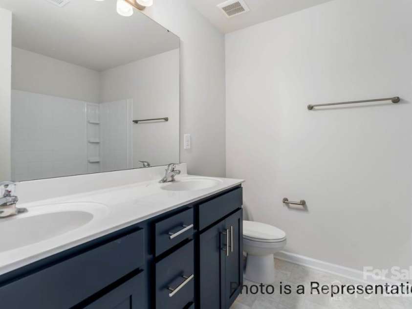 5142 Tommy Lane, Stanley, NC 28164.  MLS# CAR4263746, YatesRealty ID 24417. Hawthorn Primary Bath Double Vanity and Garden Tub/Shower Combo
