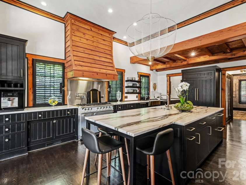 1516 Queens Road, Charlotte, NC 28207.  MLS# CAR4374609, YatesRealty ID 24418. Kitchen looking into office/flex room/den