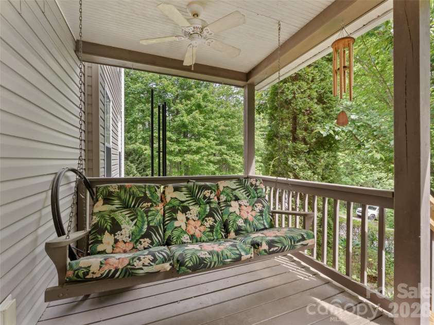 103 Old Southside Road, Saluda, NC 28773.  MLS# CAR4376836, YatesRealty ID 24422. Front porch swing