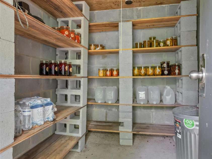 103 Old Southside Road, Saluda, NC 28773.  MLS# CAR4376836, YatesRealty ID 24422. Root cellar inside