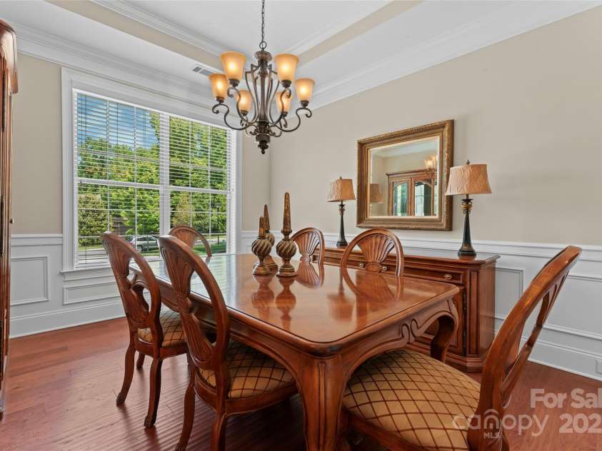 1400 Delaney Drive, Matthews, NC 28104.  MLS# CAR4255210, YatesRealty ID 24424. Dining room