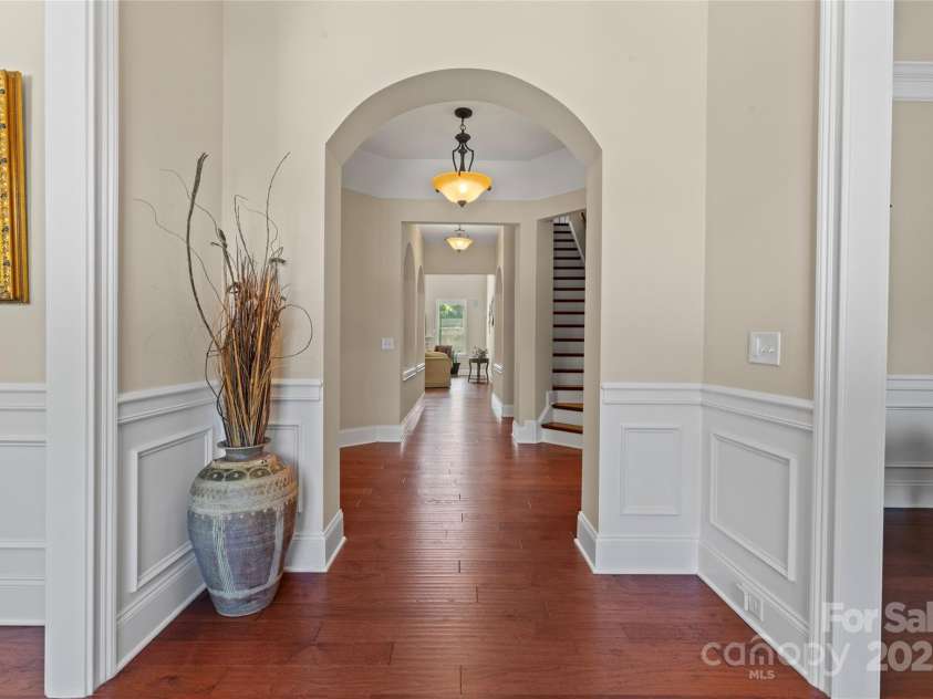 1400 Delaney Drive, Matthews, NC 28104.  MLS# CAR4255210, YatesRealty ID 24424. Foyer view coming into home