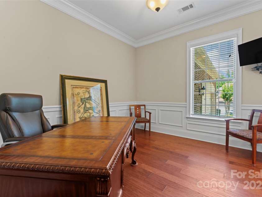 1400 Delaney Drive, Matthews, NC 28104.  MLS# CAR4255210, YatesRealty ID 24424. Main level office/study