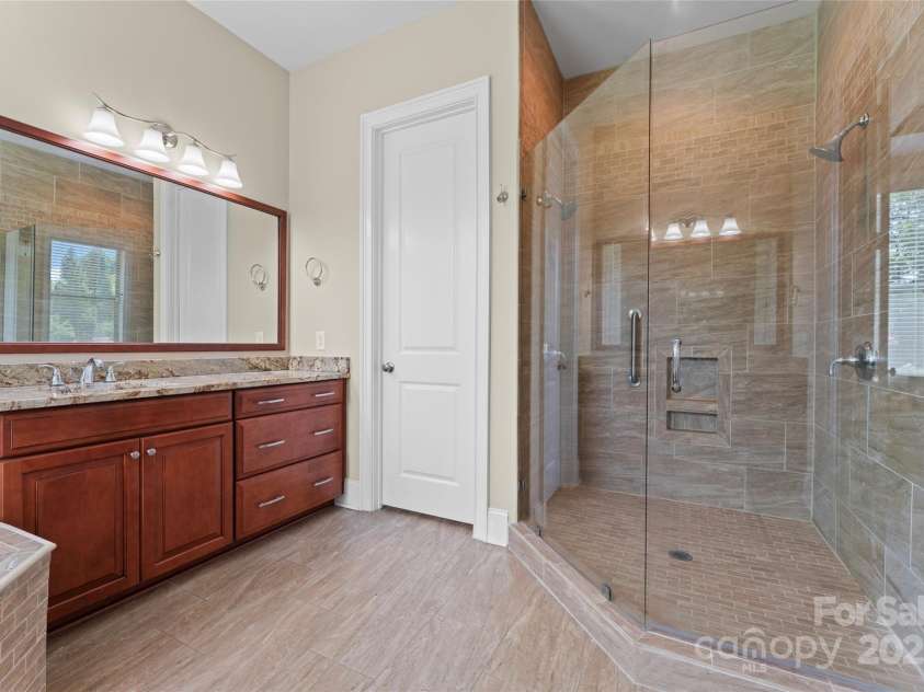 1400 Delaney Drive, Matthews, NC 28104.  MLS# CAR4255210, YatesRealty ID 24424. Master Bath w/oversized shower