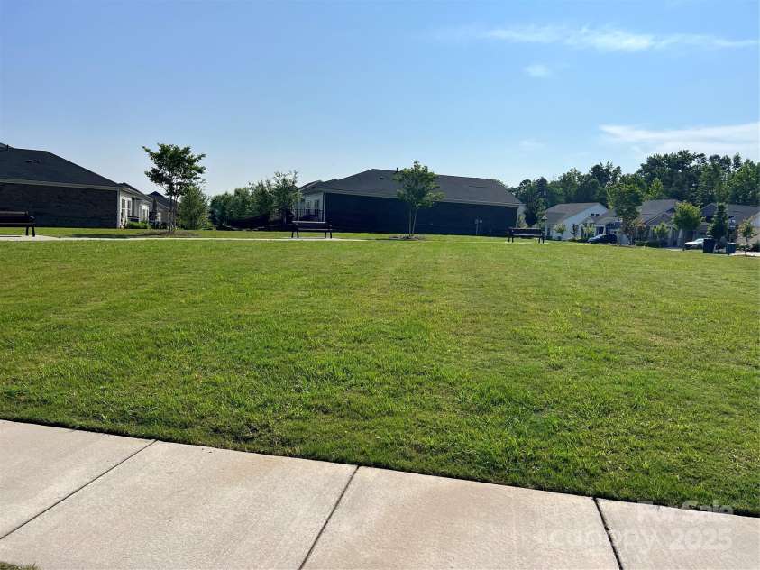 9226 Dunwich Drive, Gastonia, NC 28056.  MLS# CAR4268890, YatesRealty ID 24429. Open park area located just across the street