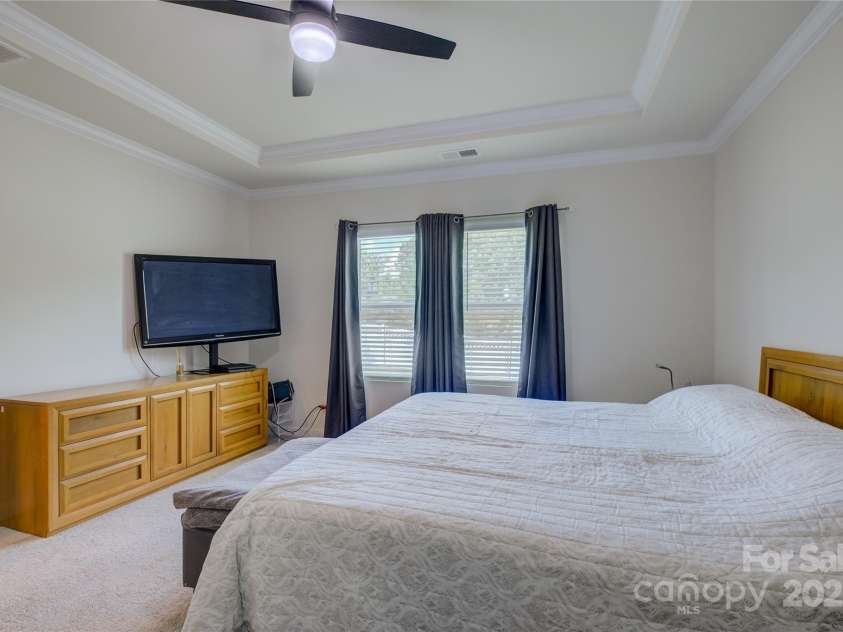 9226 Dunwich Drive, Gastonia, NC 28056.  MLS# CAR4268890, YatesRealty ID 24429. Primary bedroom with private view of back yard