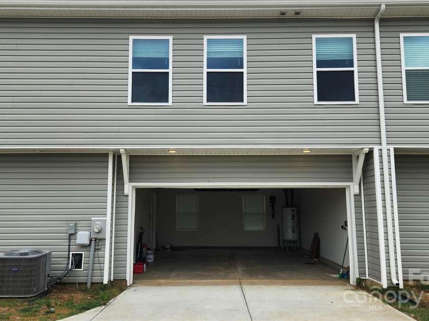 14727 Choate Circle, Charlotte, NC 28273.  MLS# CAR4287456, YatesRealty ID 2443. 2 car garage in each unit