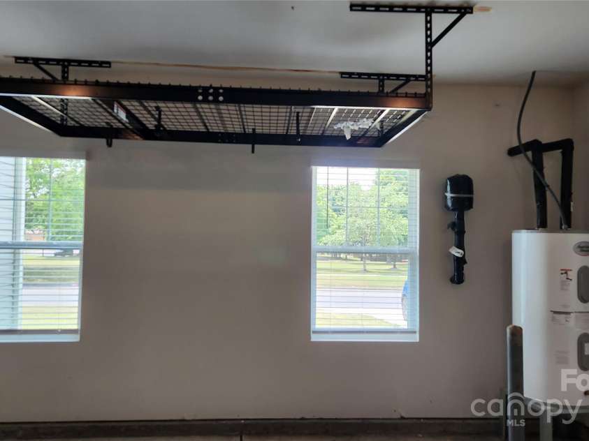 14727 Choate Circle, Charlotte, NC 28273.  MLS# CAR4287456, YatesRealty ID 2443. Ample natural light in garages