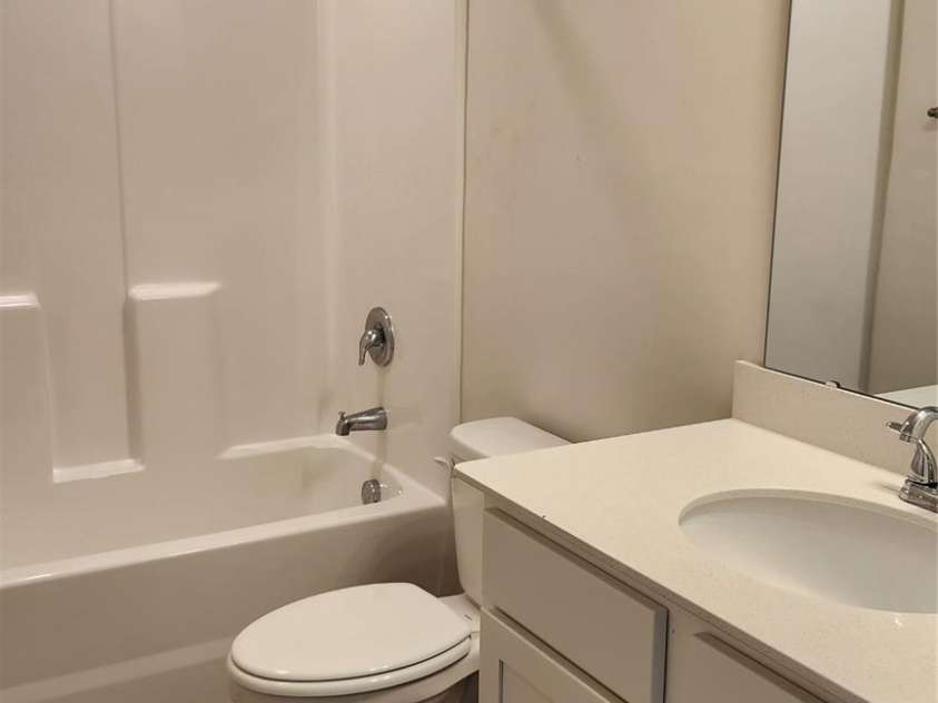 14727 Choate Circle, Charlotte, NC 28273.  MLS# CAR4287456, YatesRealty ID 2443. Hallway bathroom