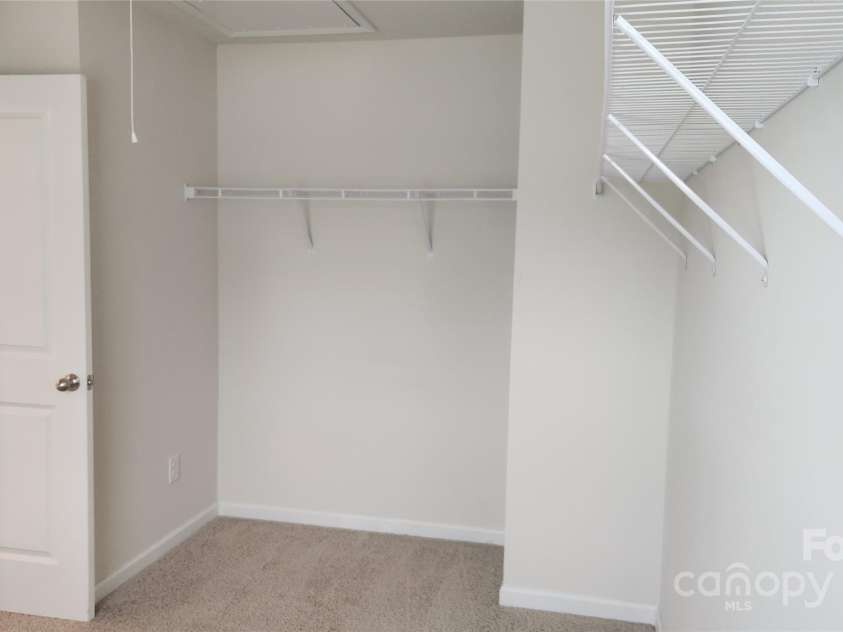 14727 Choate Circle, Charlotte, NC 28273.  MLS# CAR4287456, YatesRealty ID 2443. Walking closet in main bedroom