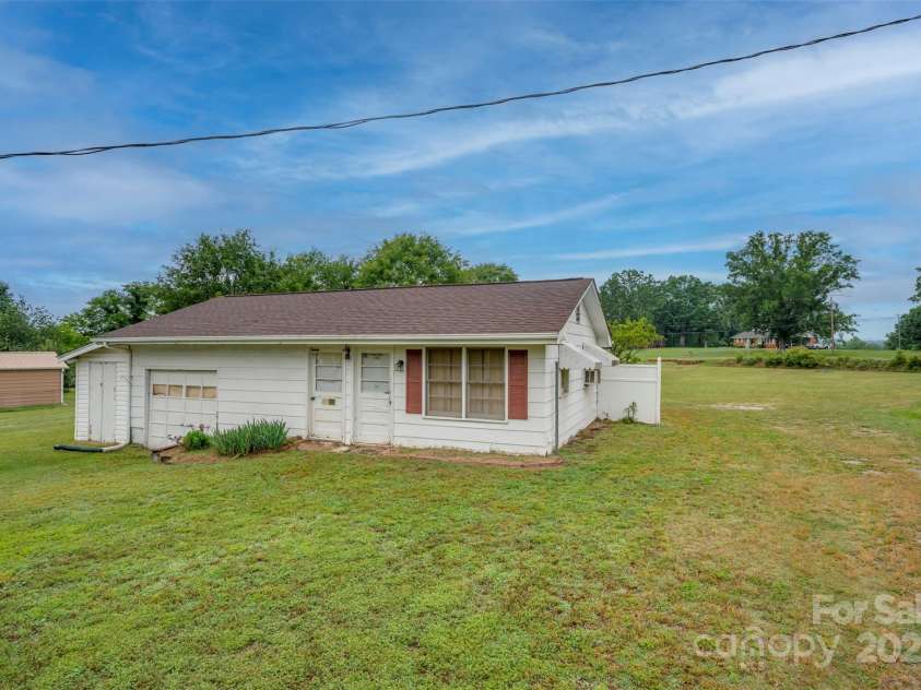 1761 Oak Grove Church Road, Ellenboro, NC 28040.  MLS# CAR4259419, YatesRealty ID 24431. Detached Garage has mower storage on left, Large garage, also a full bath (needs work) and the 300+ finished room.  So many possibilities here!