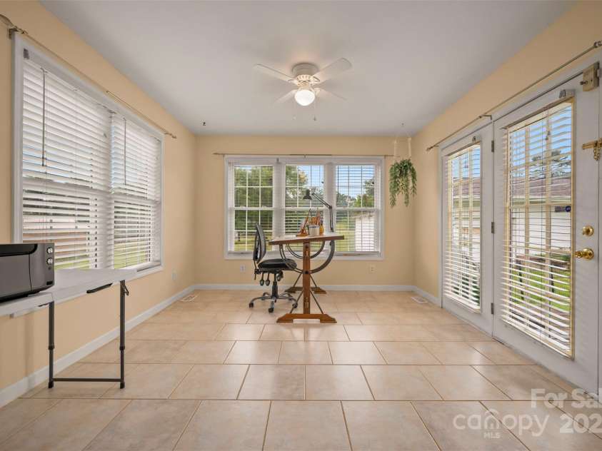 1761 Oak Grove Church Road, Ellenboro, NC 28040.  MLS# CAR4259419, YatesRealty ID 24431. Gorgeous Sunroom/Sitting area has ceramic floors and LOTS of natural light!