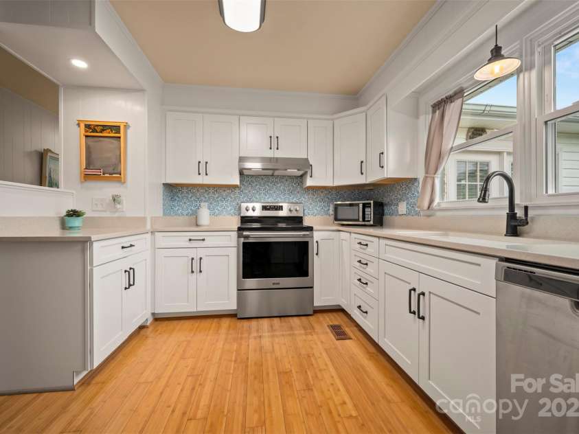 1761 Oak Grove Church Road, Ellenboro, NC 28040.  MLS# CAR4259419, YatesRealty ID 24431. Kitchen Has Quartz Counters, SS Appl, and Pass Through Window.