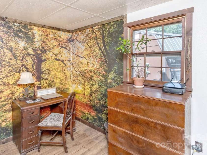 557 Tumbling Fork Road, Waynesville, NC 28785.  MLS# CAR4276307, YatesRealty ID 24432. Primary Bedroom on Main