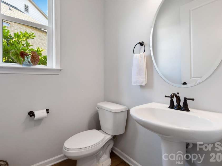 1124 Greenbridge Drive, Matthews, NC 28105.  MLS# CAR4373160, YatesRealty ID 24433. Powder room