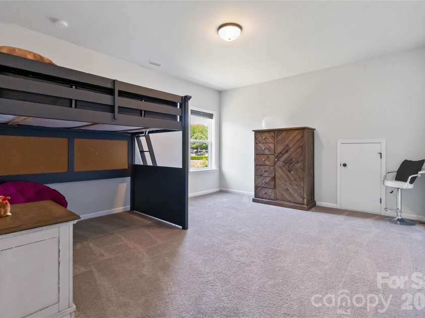 1124 Greenbridge Drive, Matthews, NC 28105.  MLS# CAR4373160, YatesRealty ID 24433. Spacious bedroom #2!