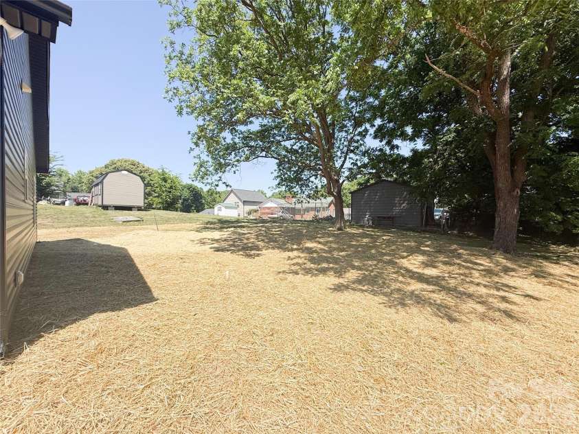707 Robin Avenue, Kannapolis, NC 28081.  MLS# CAR4382666, YatesRealty ID 24435. Backyard 
