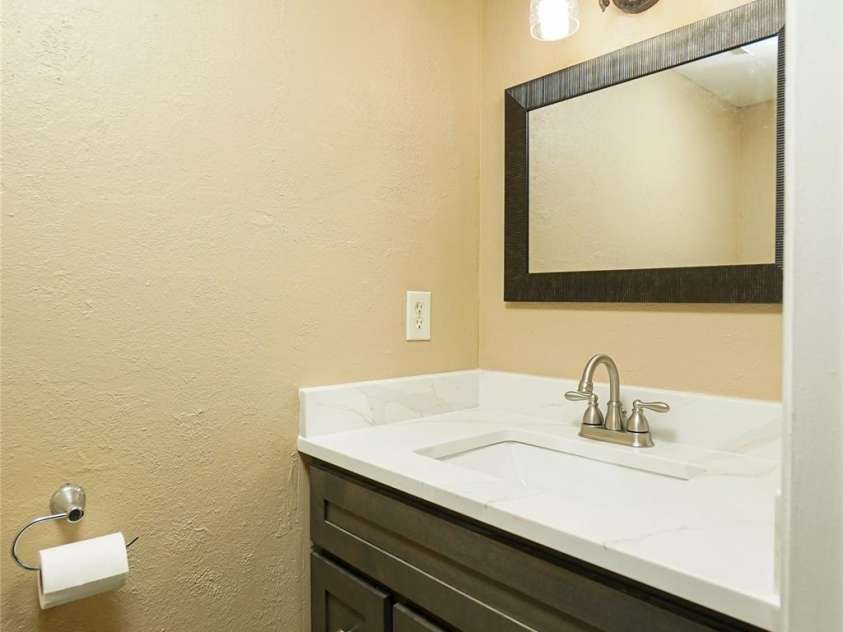 8835 Hunter Ridge Drive, Charlotte, NC 28226.  MLS# CAR4251538, YatesRealty ID 24436. 1/2 Bath has new vanity, lights and mirror