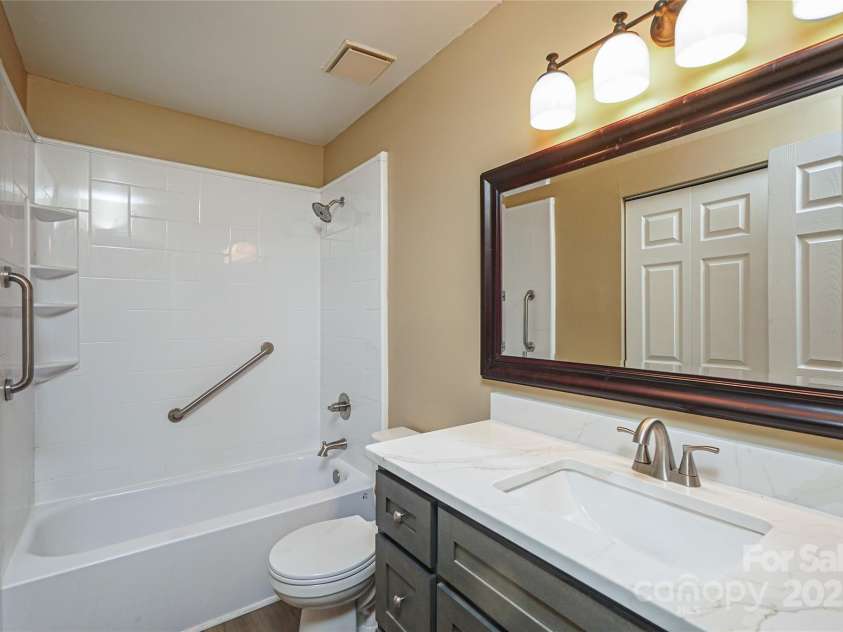 8835 Hunter Ridge Drive, Charlotte, NC 28226.  MLS# CAR4251538, YatesRealty ID 24436. Full size bath has new vanity. Laundry has new full size washer /Dryer