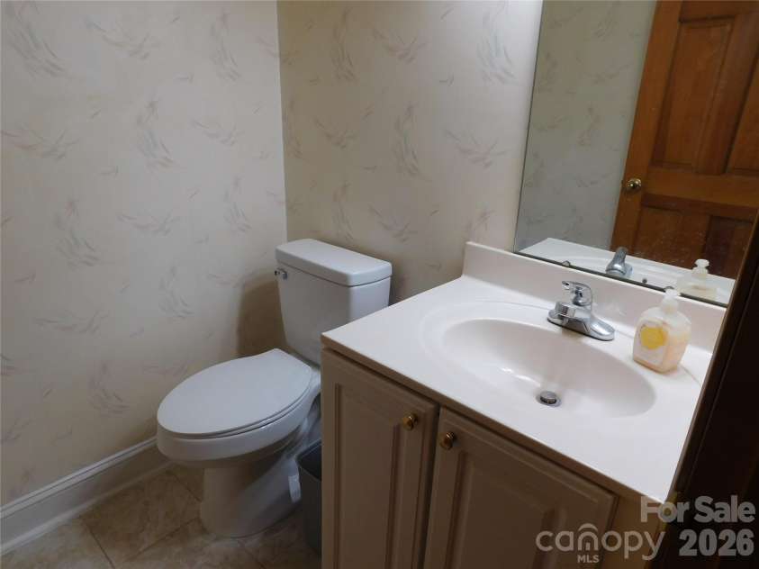 5314 Brookwood Court, Waxhaw, NC 28173.  MLS# CAR4342325, YatesRealty ID 24439. Half bath- main level