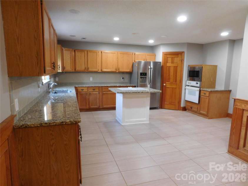 5314 Brookwood Court, Waxhaw, NC 28173.  MLS# CAR4342325, YatesRealty ID 24439. Kitchen view from great room