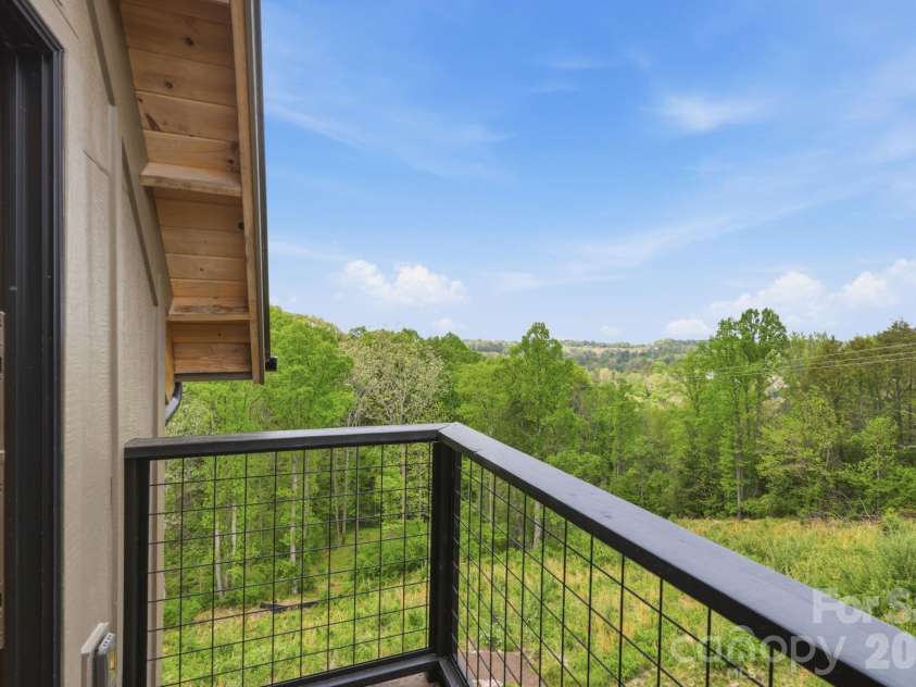 244 Westridge Farm Road, Asheville, NC 28804.  MLS# CAR4371030, YatesRealty ID 24441. Balcony off upstairs den